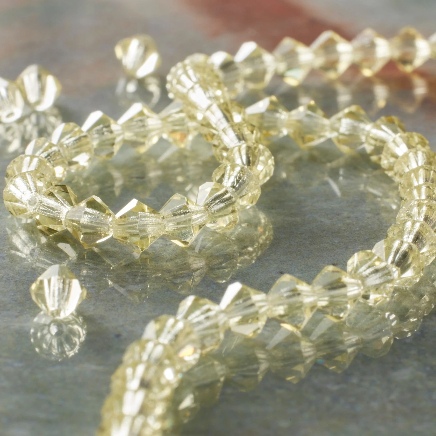 12 Pack: Preciosa® Czech Crystal Bicone Beads, 4mm By Bead Landing™ 4 12 Pack: Preciosa® Czech Crystal Bicone Beads, 4mm By Bead Landing™ - Image 2